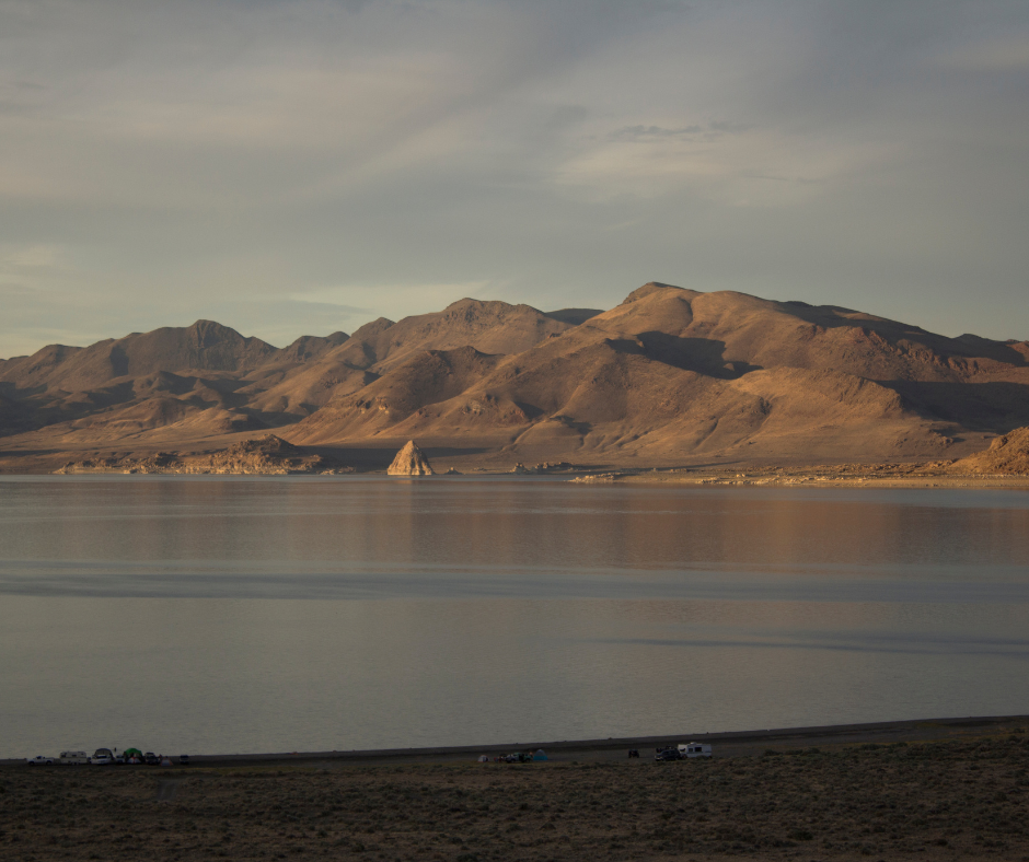 Pyramid Lake on a summer eve with clouds in the sky